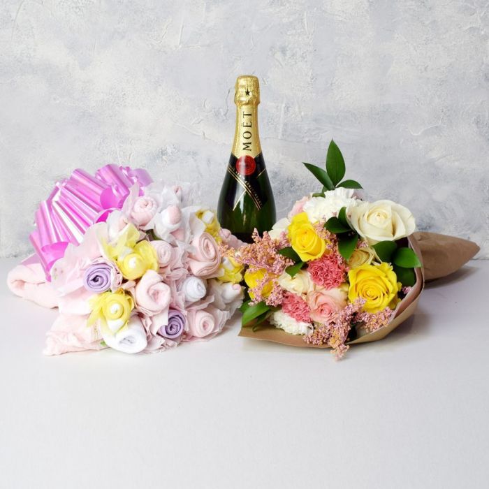 Baby Girl Champagne Gift Basket – gift basket with bottle of champagne, seasonal floral arrangement and hat